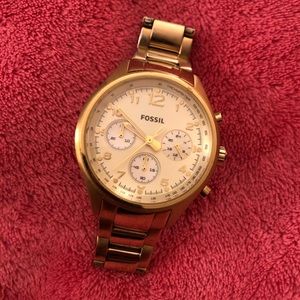 Women’s gold fossil watch
